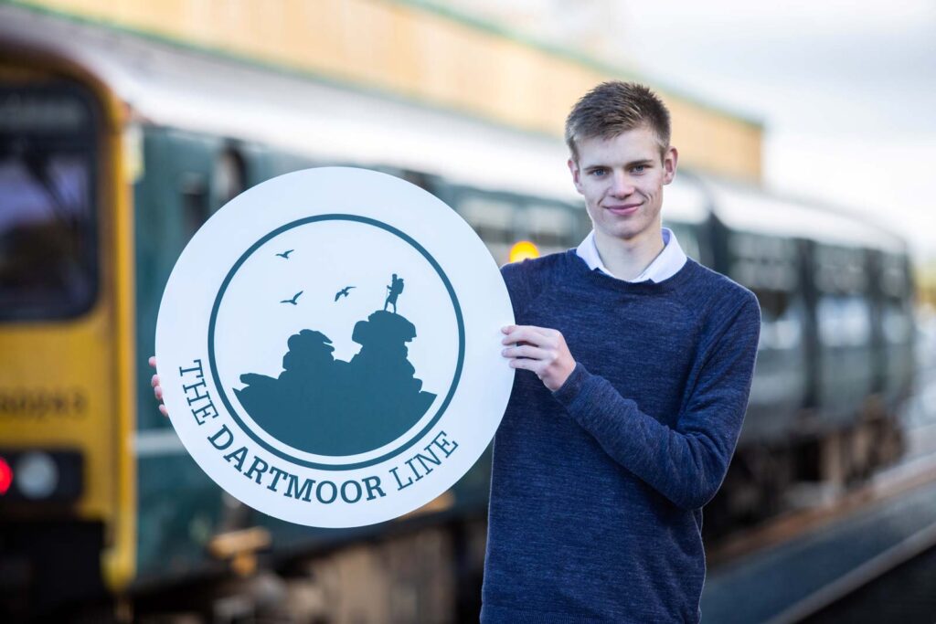 Dartmoor Line logo with its designer Tom Watts