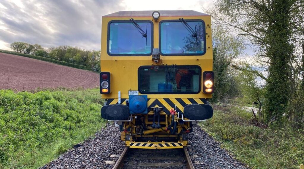 Track tamping machine on the Dartmoor Line